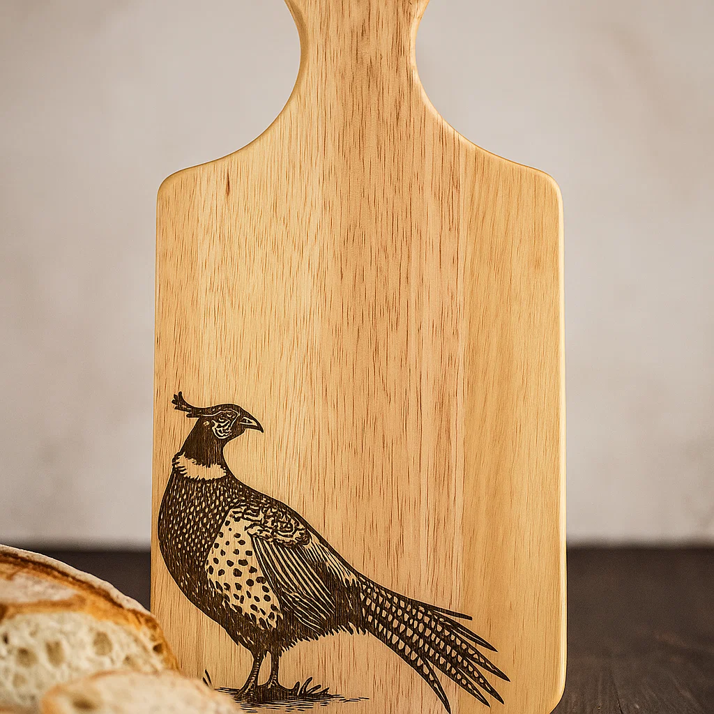Engraved serving board featuring Scotland’s elegant Pheasant, handcrafted from sustainable rubberwood.