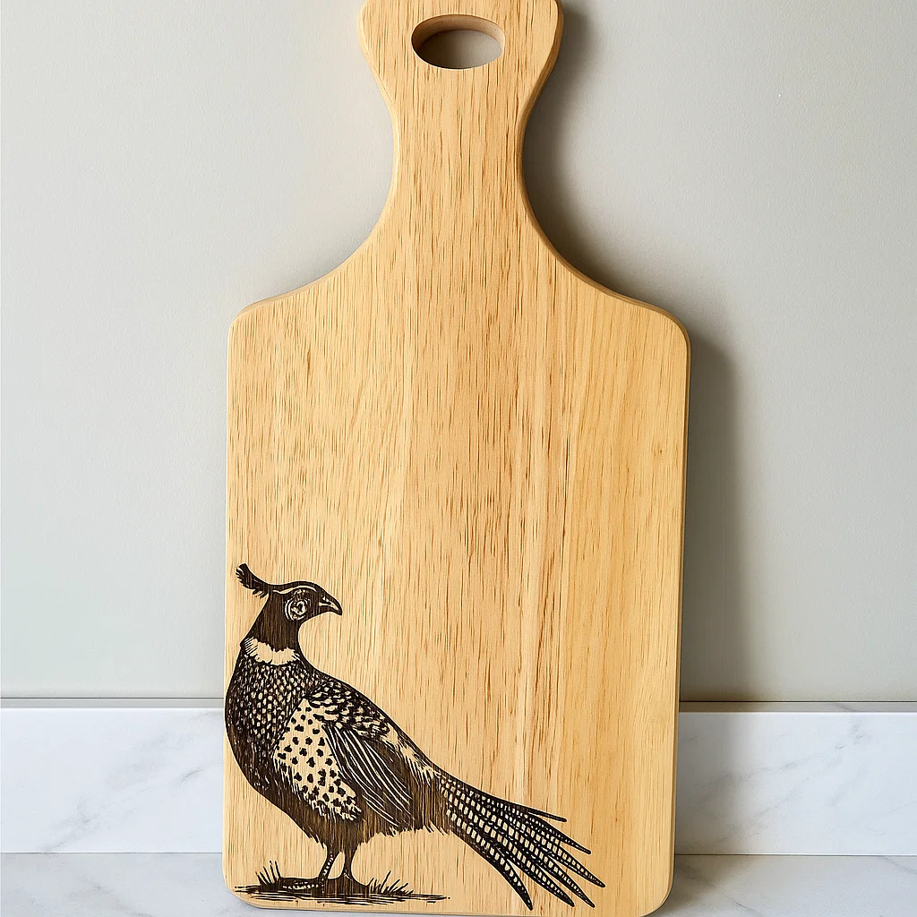 Engraved serving board featuring Scotland’s elegant Pheasant, handcrafted from sustainable rubberwood.