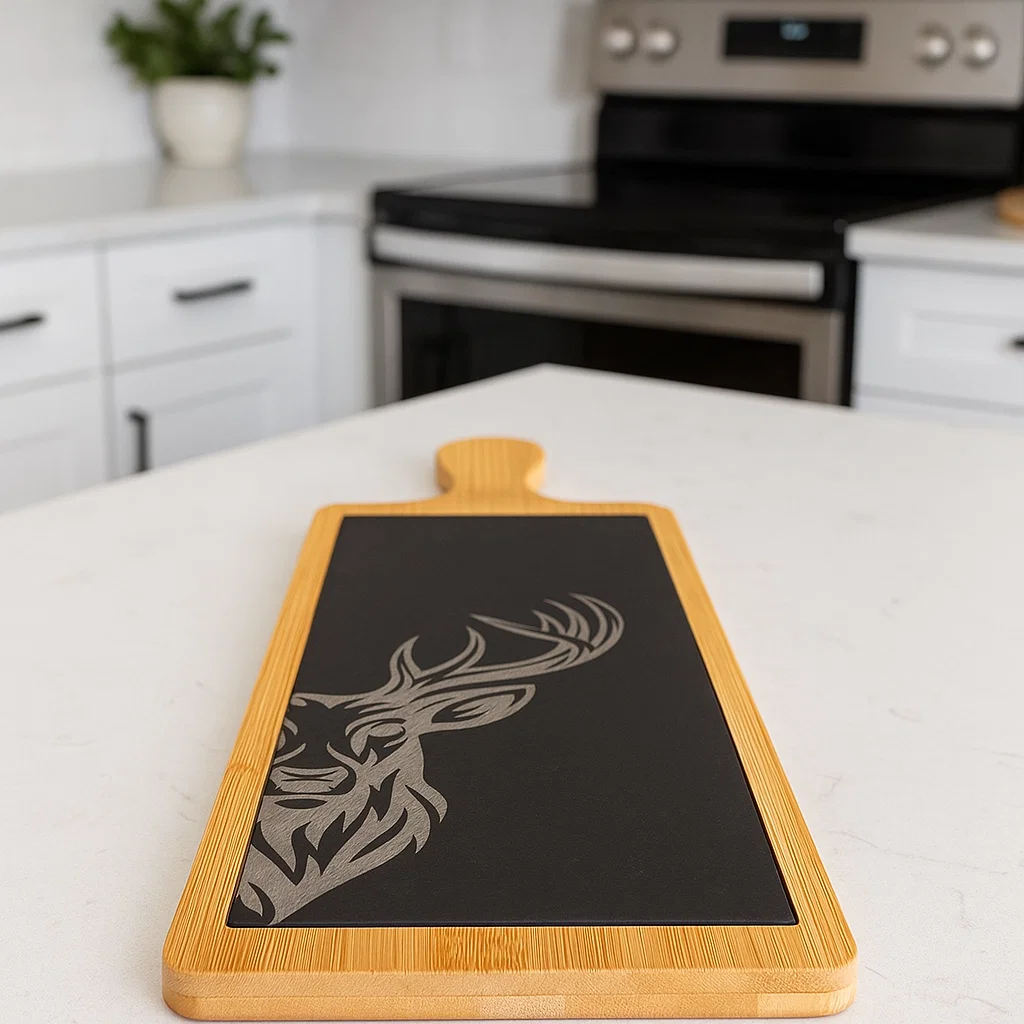 Wood and slate Charcuterie board with an engraved Stag. Part of the Scottish Wildlife Collection.